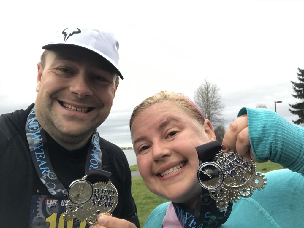 Chris and Gretchen with their medals from the January 5k in Everett, Washington